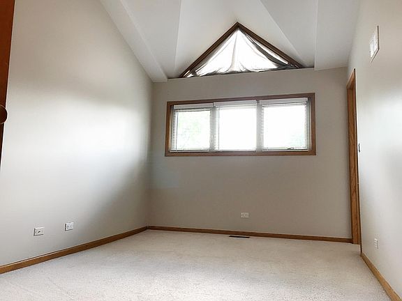 Master bedroom 10x19 with 19ft Vaulted Ceilings with Huge Wa