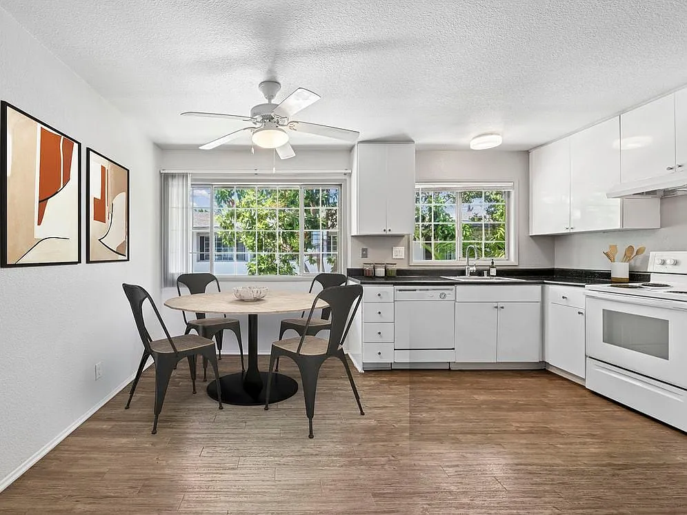 Kitchen and dining area with hard surface flooring - AVA Newport