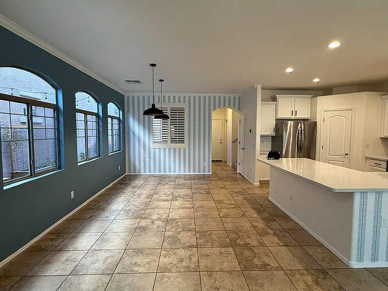 Open dining space with seamless flow to the kitchen and living room.
