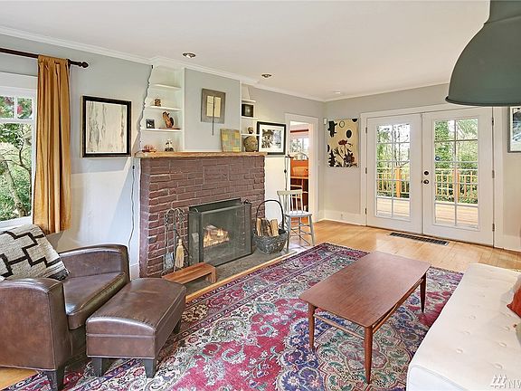 Living room with a cozy wood fireplace 