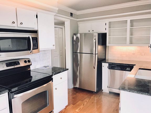 Stainless steel appliances - microwave, range and refrigerat
