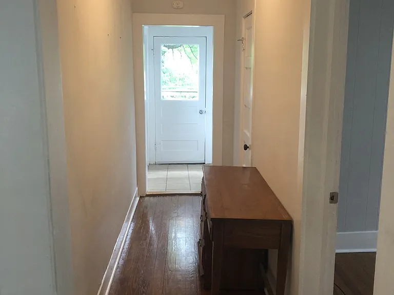 Hall way from front door to back door second bedroom door