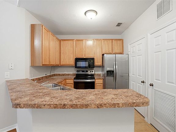 5th image of 9916 Courtney Palms Blvd APT 302