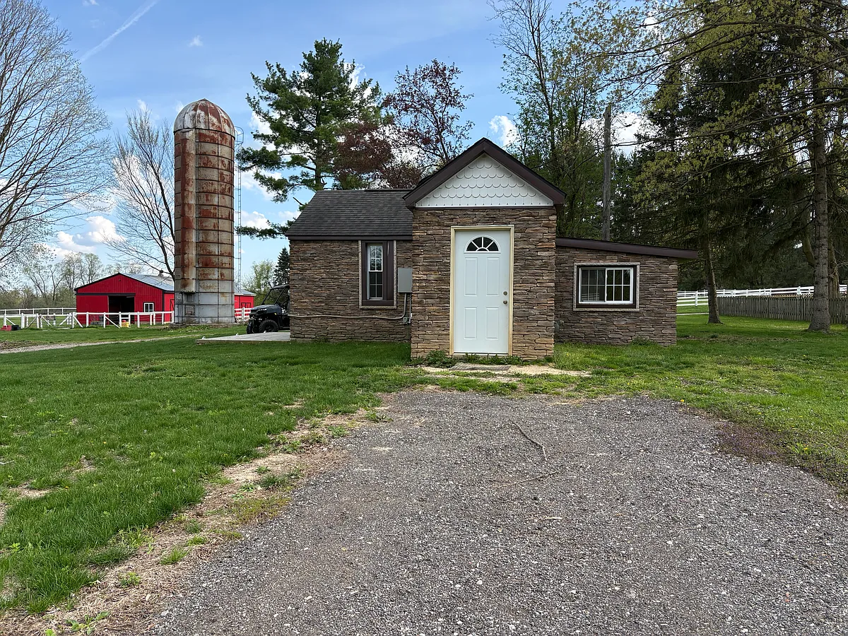 Side door and parking. - 1585 S Garner Rd