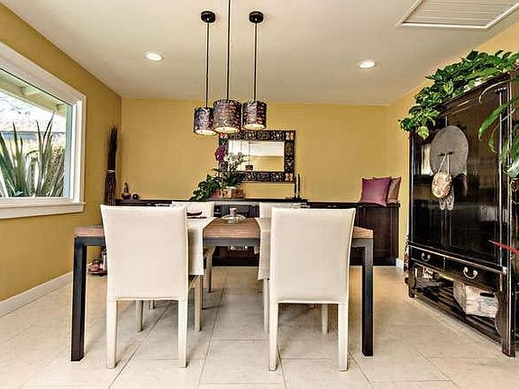 dining room. wall color is now a soft gray