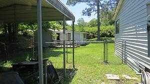 FENCED REAR AND SHEDS