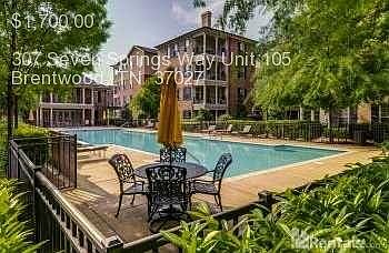 Saltwater pool and lush landscape.