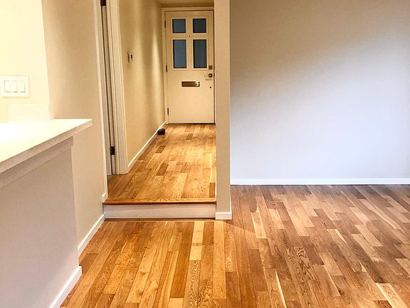 Entrance hallway into living area.