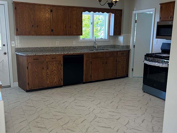 Kitchen
- New flooring
- New paint
- New lighting
- New appliances
- Refurbished cabinets