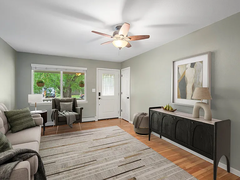 Cheerful entry room. Could be great for T.V. or dining too.