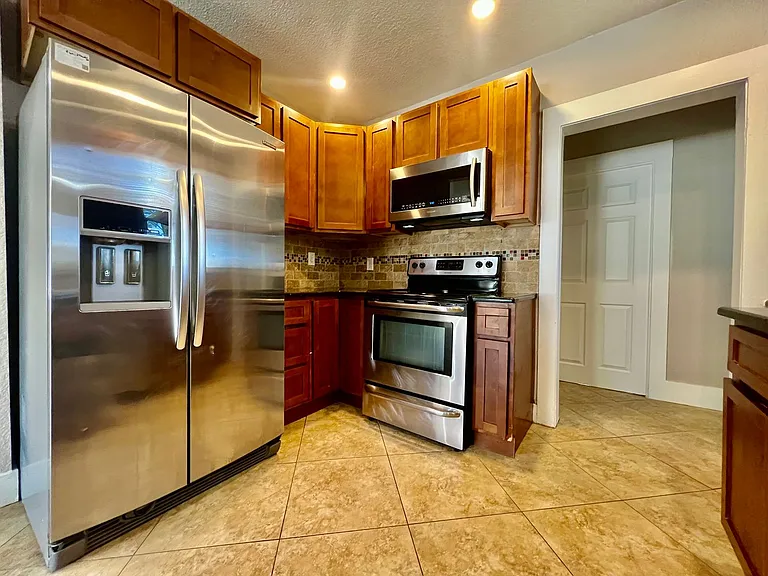 6531 Monaco St — Photo 7