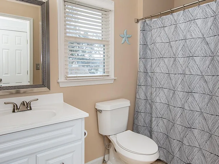 Hall bath with tub/shower combo