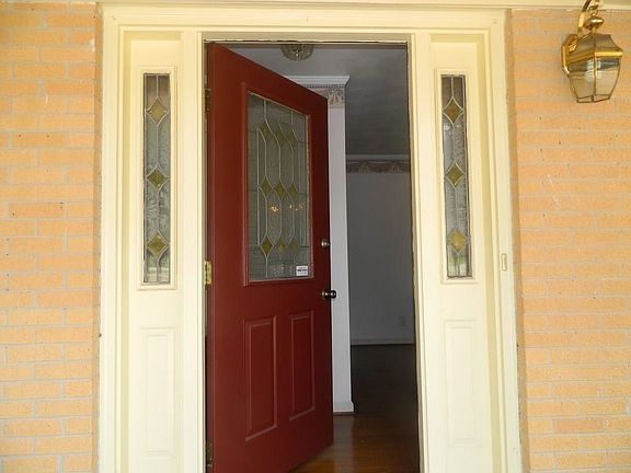 Notice the beautiful door and side lights. Come on in!