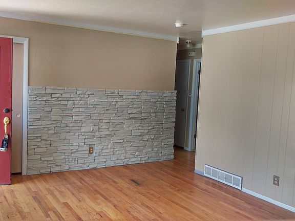Living room w/ wall tile
