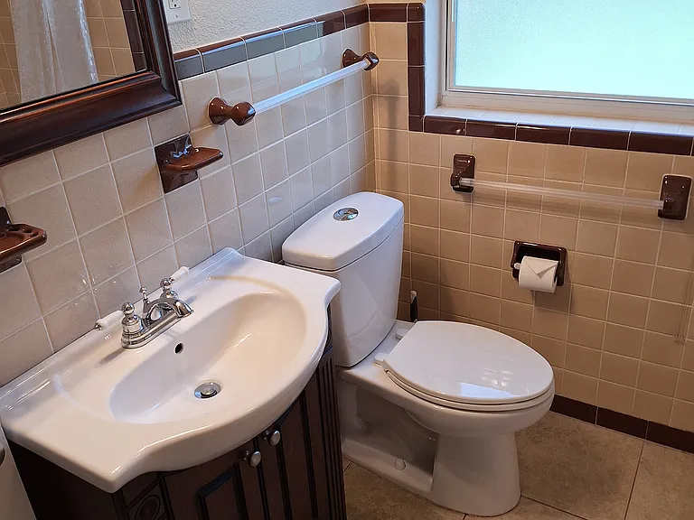 Hall bathroom with bathtub