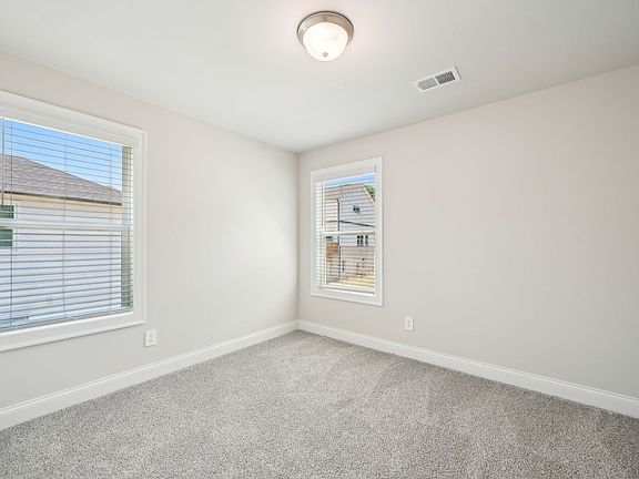 Secondary Bedroom in the Oleander floorplan at a Meritage Homes community in Atlanta, GA.