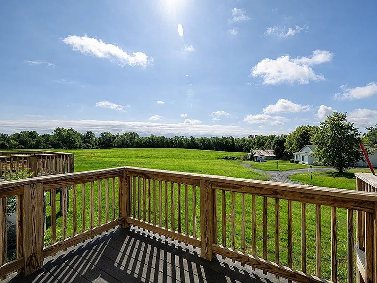 Serene countryside view from deck