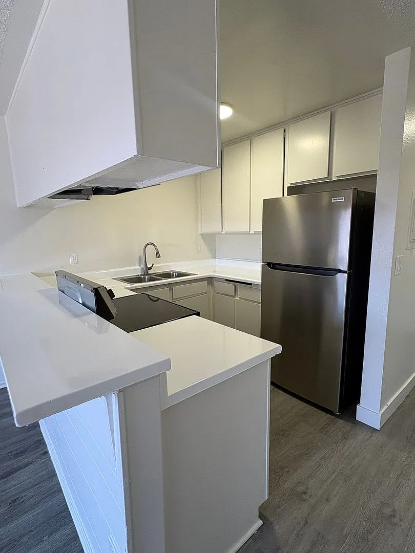 Woodman Apartments — Photo 1