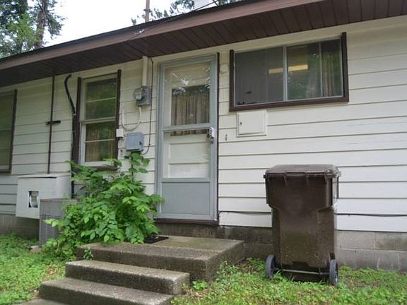 The side entrance opens into the kitchen area.