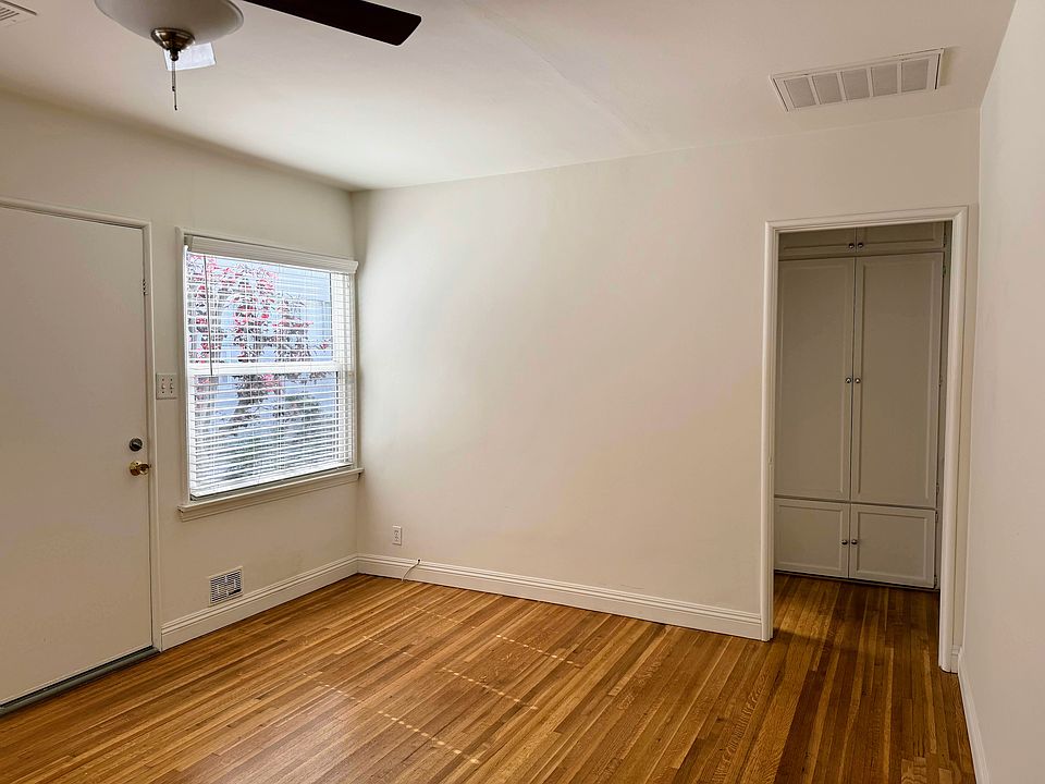 Side space in living room perfect for a desk, reading area, etc.