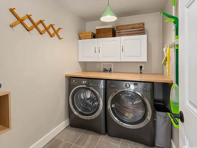 Shows old machines, new Samsung Washer & Dryer installed in March 2026.