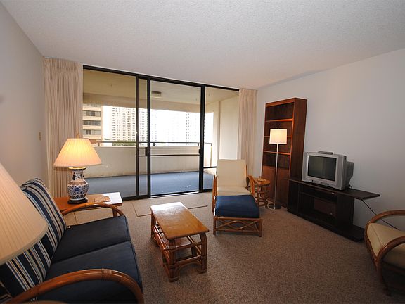 Large open living & dining area. Peaceful park and city views! Lamps available for tenant use.