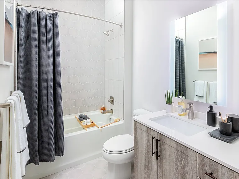 Bathroom with Quartz Countertops and Hexagon Tile