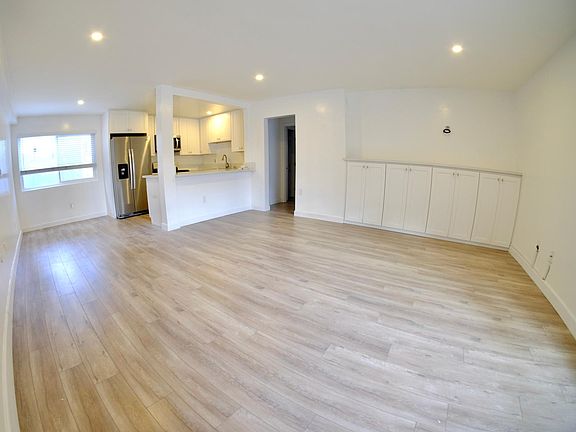 Recessed lighting sets the ambiance. Lots of built in storage. Wired for a mounted flat screen TV. Lovely open concept floor plan.