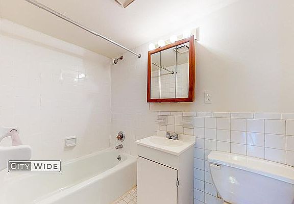 3rd image of 307 E 9th St #1D