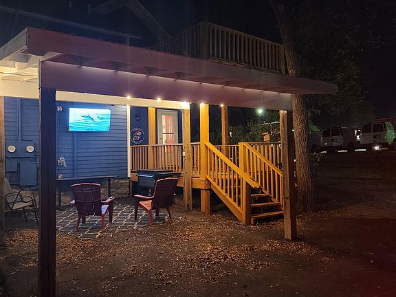 Outstanding back patio area for tailgating and watching sports