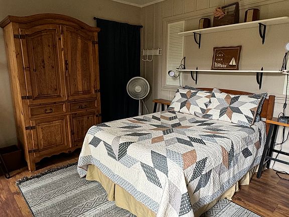 PACK YOUR BAGS, OUR FURNISHED STUDIO HAS EVERTHING YOU NEED.

Main room, armoire with tv/storage. The curtain door in view is key locked; this door leads to our home.