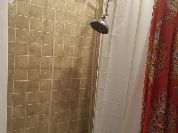 Shower in free standing tube
