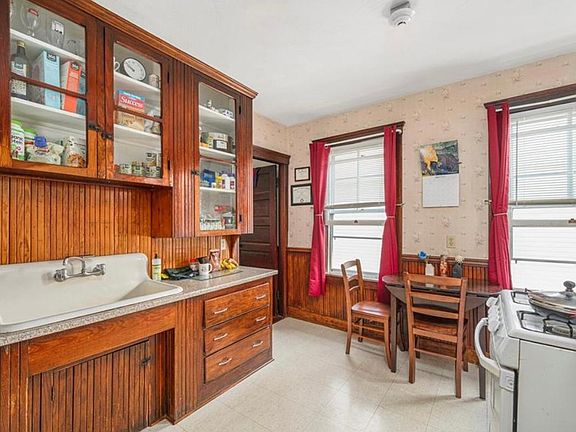 gorgeous original solid wood cabinets and farmer sink