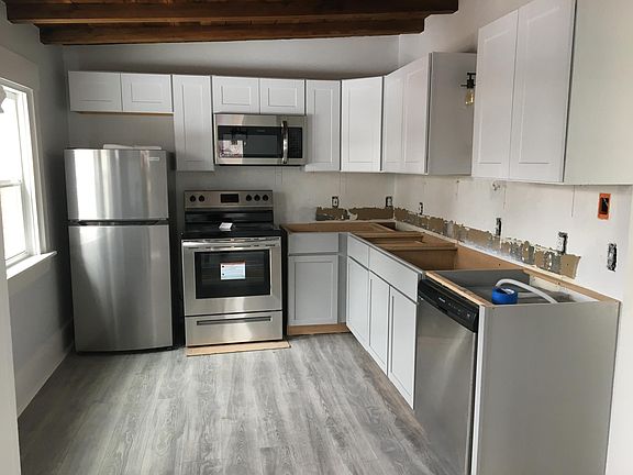 Kitchen- under renovation- new stone countertop, sink, faucet and backsplash will be installed prior to move in