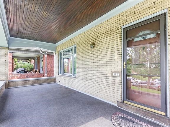 Expansive front porch is perfect for relaxing and entertaining