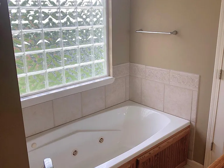 Primary Bath with separate tub and walk-in shower
