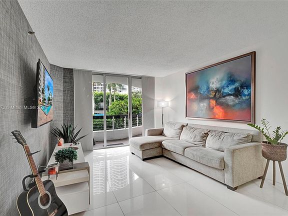 4th image of 3600 Mystic Pointe Dr APT 203