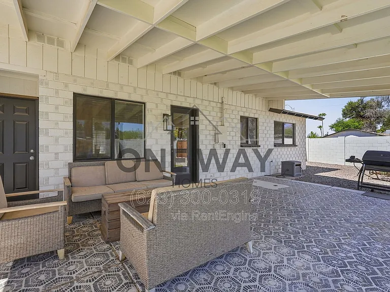 8702 E Sheridan St — Photo 24
