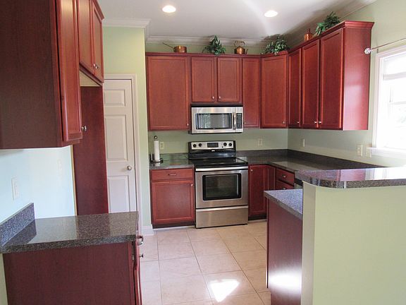 Kitchen w/ cherry cabinets