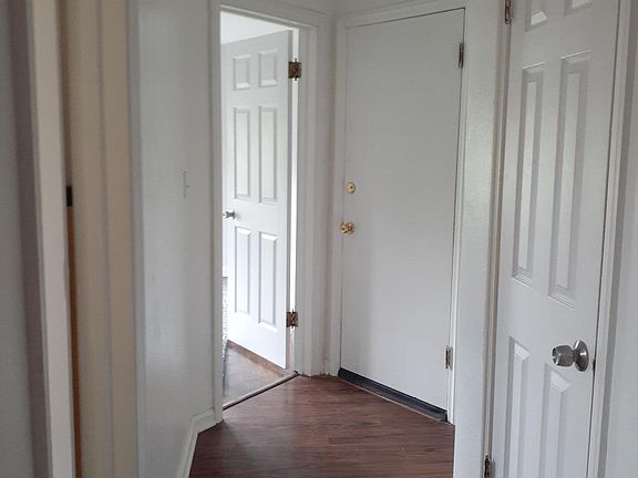 Looking down the hall from the kitchen to the bedroom.