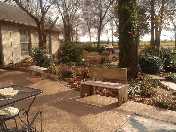 Lovely concrete front porch.