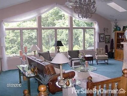 Great Room 20 x 30 feet
						:
						Theatre Surround sound, fireplace custom-designed window, theater-lighting