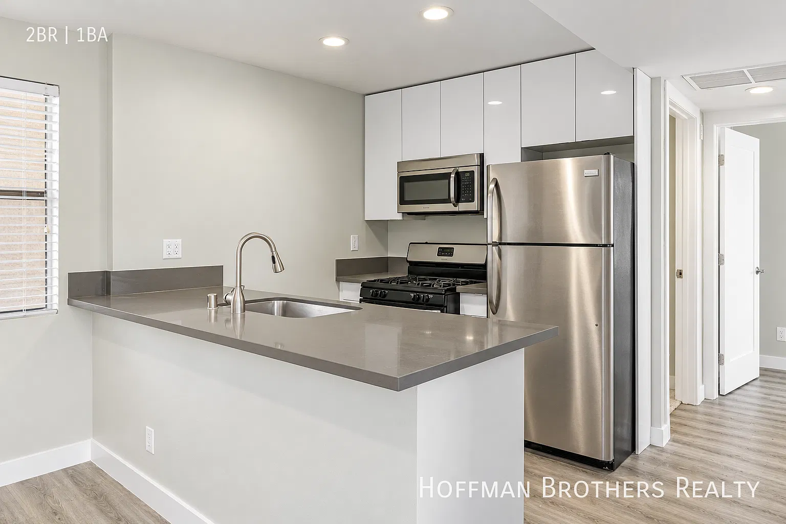 Top-Floor 2BR with In-Unit Laundry, A/C, Stainless Steel Kitchen & Tandem Gated Parking! — Photo 2