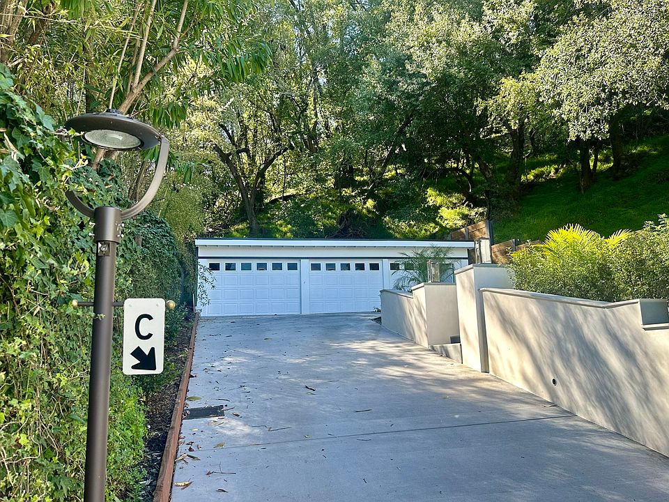 Main (upper floor) entrance to Unit C through the pillars