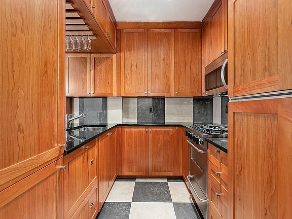 5th image of 393 W 49th St APT 2D