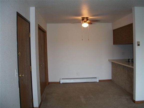 Quaint Dining Area With Serving Window to Kitchen