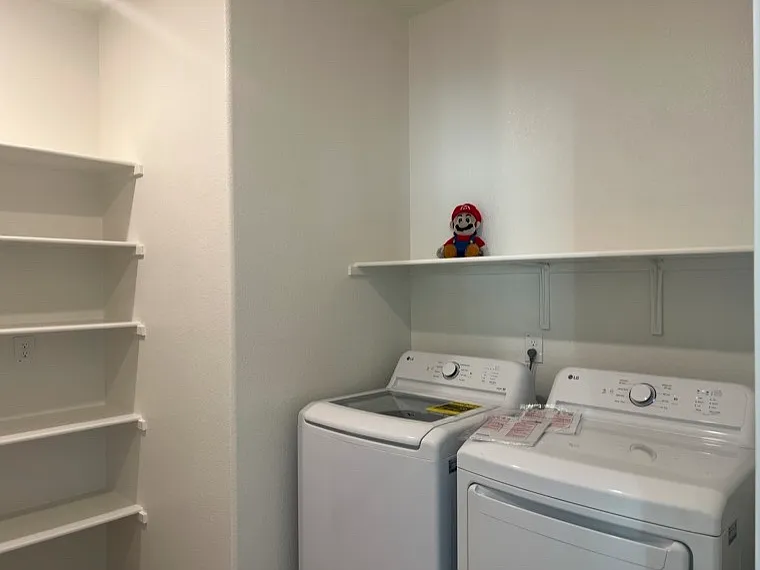 Laundry Room is upstairs, with lots of storage space.