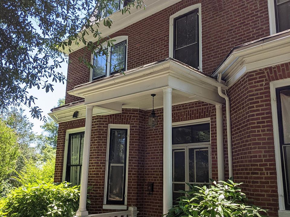 Front entrance faces private lane