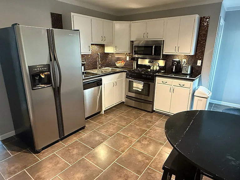 Kitchen stocked with all standard appliances, kitchen accessories, and pantry essentials to get you started!