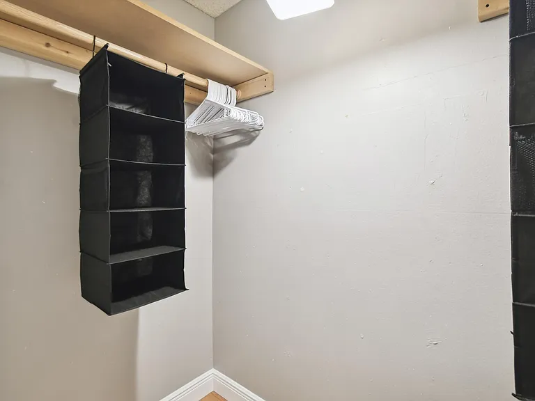 Across the hall your own master suite walk in closet